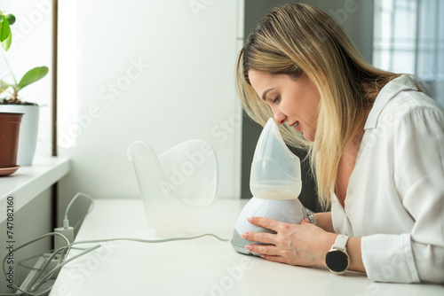 Woman has a bad cold and is trying therapy by inhaler