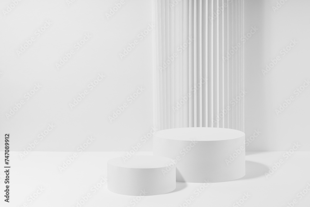 Two white round podiums with striped column as geometric decor, mockup on white background. Template for presentation cosmetic products, gifts, goods, advertising in contemporary black friday style. Two white round podiums with striped column as geometric decor, mockup on white background. Template for presentation cosmetic products, gifts, goods, advertising in contemporary black friday style.