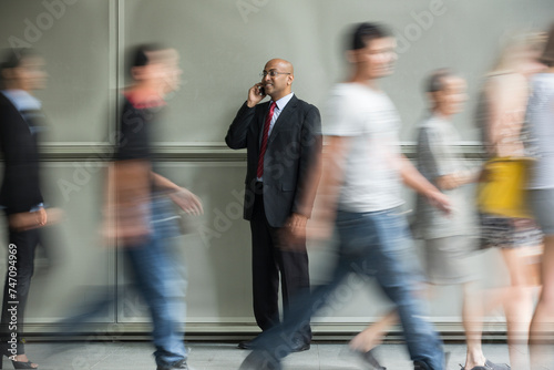 Indian Business man using a Cell Phone.