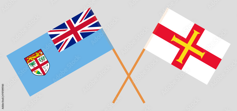 Crossed flags of Fiji and Bailiwick of Guernsey. Official colors. Correct proportion Crossed flags of Fiji and Bailiwick of Guernsey. Official colors. Correct proportion