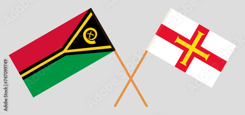Crossed flags of Vanuatu and Bailiwick of Guernsey. Official colors. Correct proportion