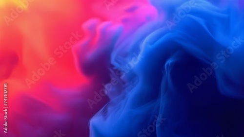 Abstract background of blue and pink smoke in water close-up