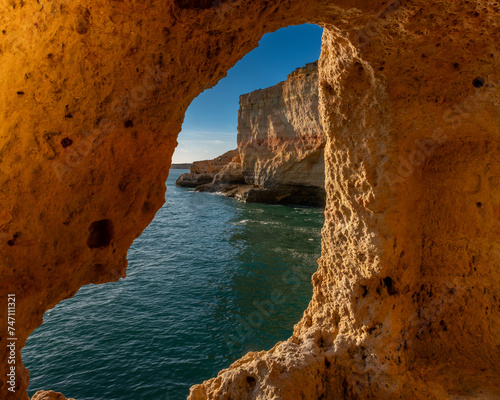 Limestones caves facing the Atlantic ocean, Algar seco cliffs, Carvoeiro, Lagoa, Algarve, Portugal.