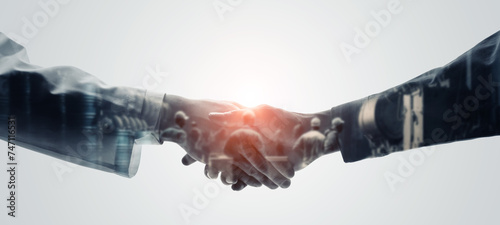 Mixed media of group of engineers shaking hands and science technology concept. Research and development. Wide angle visual for banners or advertisements.