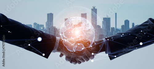 Photos Mixed media of group of people shaking hands and global communication network concept