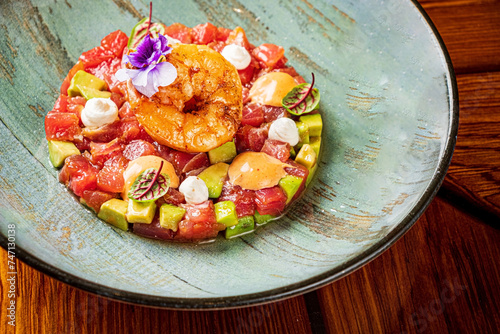 beef tartare with shirmps and avocado photo