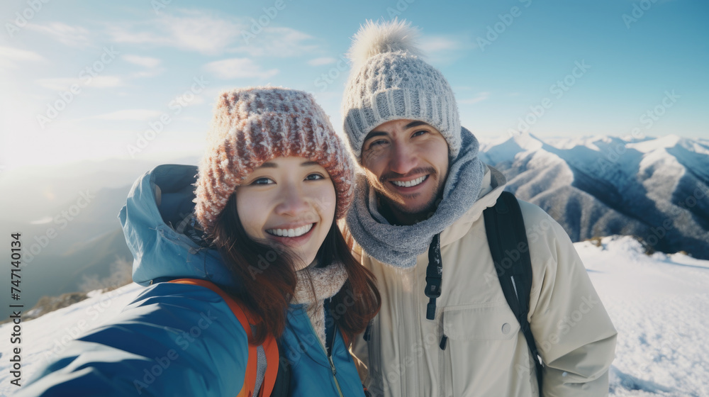 Man and woman capturing moment in snow Man and woman capturing moment in snow