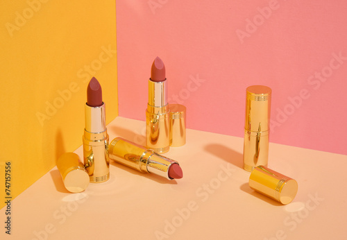 A few lipsticks for a stylish makeup look. Makeup products.