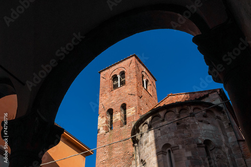 San Giusto (Saint Justus) Church medieval bell tower an apse in Lucca historica center photo