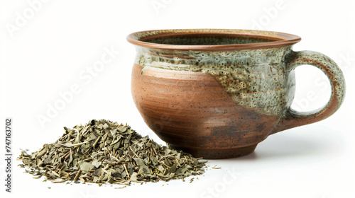 Ceramic Cup of Tea Next to a Pile of Dried