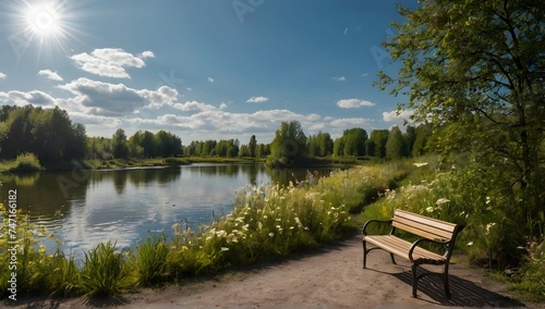 Detailed view of a park. Trail vegetation. flowers and trees. A lake . Blue sky with white feather clouds and shining sun. A bench on the side of the path. Panoramic remote shooting © Zulfi_Art