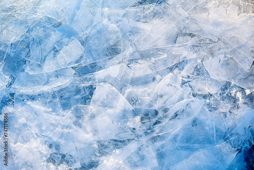 Ice background, shattered pieces of ice, blue frozen texture