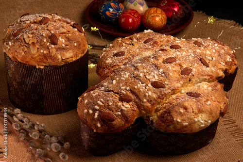 Colomba and Panettone cake is a traditional Italian Easter and Christmas dessert. Easter cake with dove. Easter and Christmas pastries
