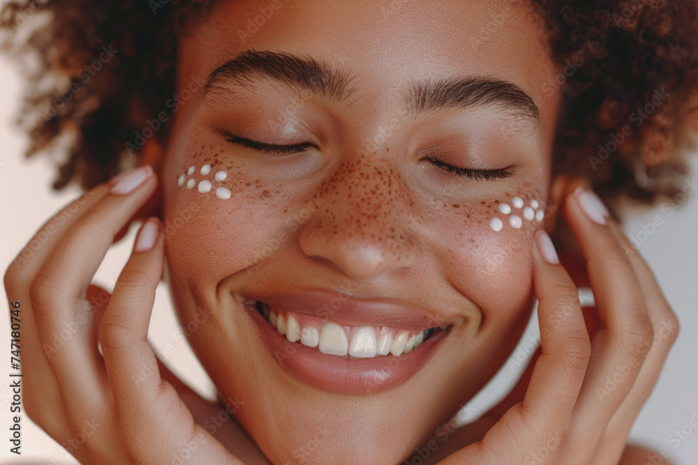 Joyful Youthful Portrait of a Smiling african american Girl with Freckles and Curly Hair, with Cream Dots on Her Cheeks Joyful Youthful Portrait of a Smiling african american Girl with Freckles and Curly Hair, with Cream Dots on Her Cheeks