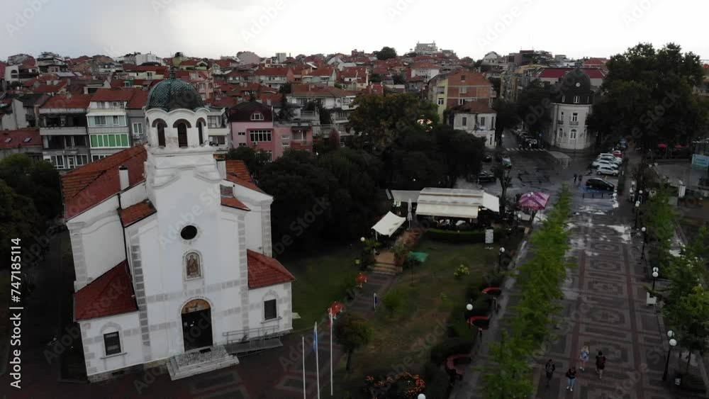 Aerial view of church and city center buildings street in Bulgaria Pomorie old town. Drone view from above. Summer holidays destination Aerial view of church and city center buildings street in Bulgaria Pomorie old town. Drone view from above. Summer holidays destination