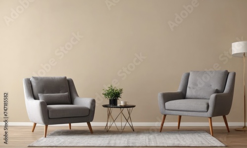 Designer grey armchairs, chic furnishings, plants, and elegant accessories create a stylish modern living room.