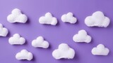A knitted toy with a white cloud on a purple background. Children's clothes and accessories. View from above.