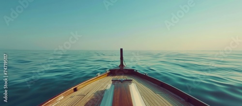 Close up a bow of yacht seaward with beautiful blue deep sea landscape, AI generated image photo