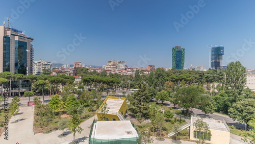 Panorama showing cityscape over Tirana with its colorful apartment buildings and skyscrapers timelapse, Tirana, Albania. photo