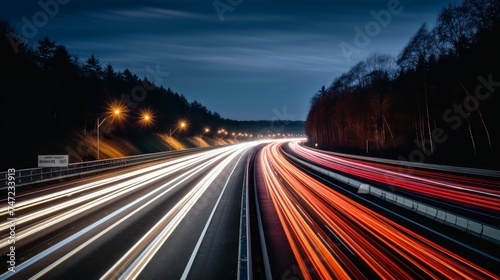 Car light trails on the road at night. Long exposure