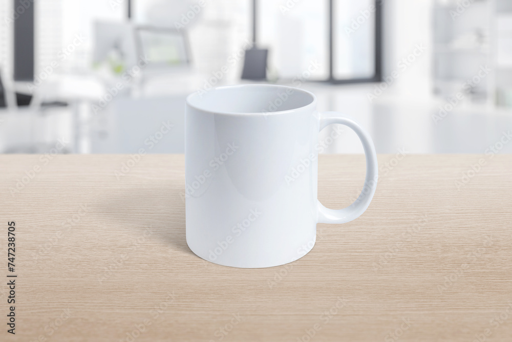 White mug on office desk with clean survace for logo branding, promotion