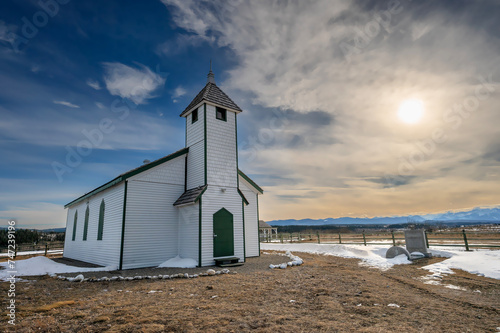 Evening view of the historic MacDougall United Mission Church on the Stoney Indian Reserve at Morley, Alberta, Canada photo