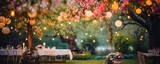 blurry garden wedding background decorated with fairy lights in summer