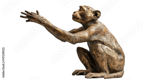 A striking bronze statue of a monkey sitting and extending its hand, captured in high detail on a white background