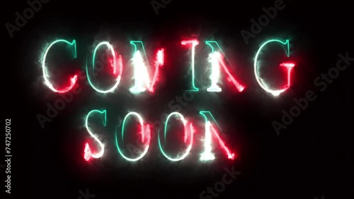 Animation of coming soon text in red and blue neon letters on black background photo