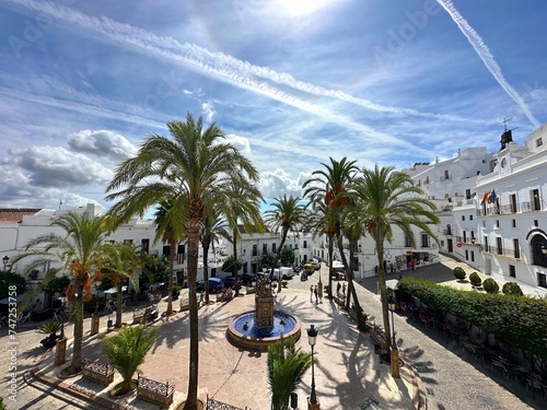 beautiful Plaza de España with fountain and palms in the historic old town of Vejer de la Frontera, hilltop town near Cádiz, Andalusia, Costa de la Luz, Spain, Europe photo