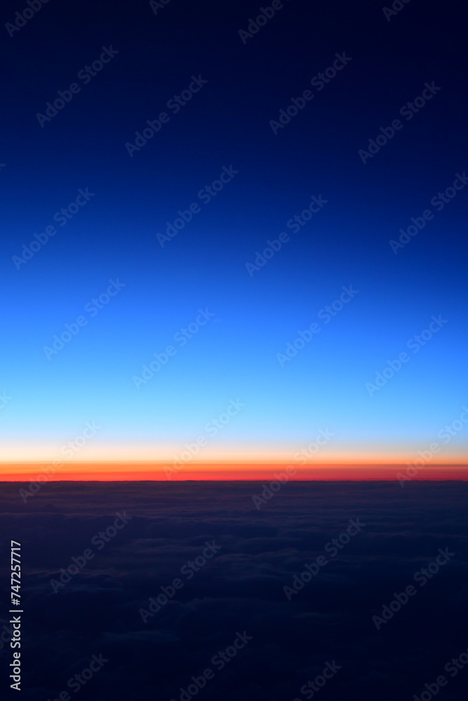 View of sunset from Airplane Window colorful