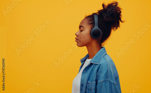 Tranquil Harmony: Young Woman Enjoying Music in Casual Attire © Curioso.Photography