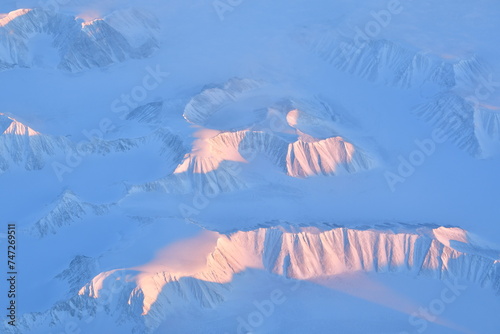 View of Greenland from Jet Plain Window in Winter Nature cold ice Mountains