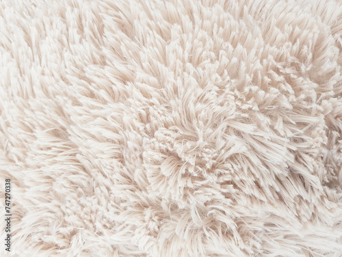 Fuffy soft textile material texture background.