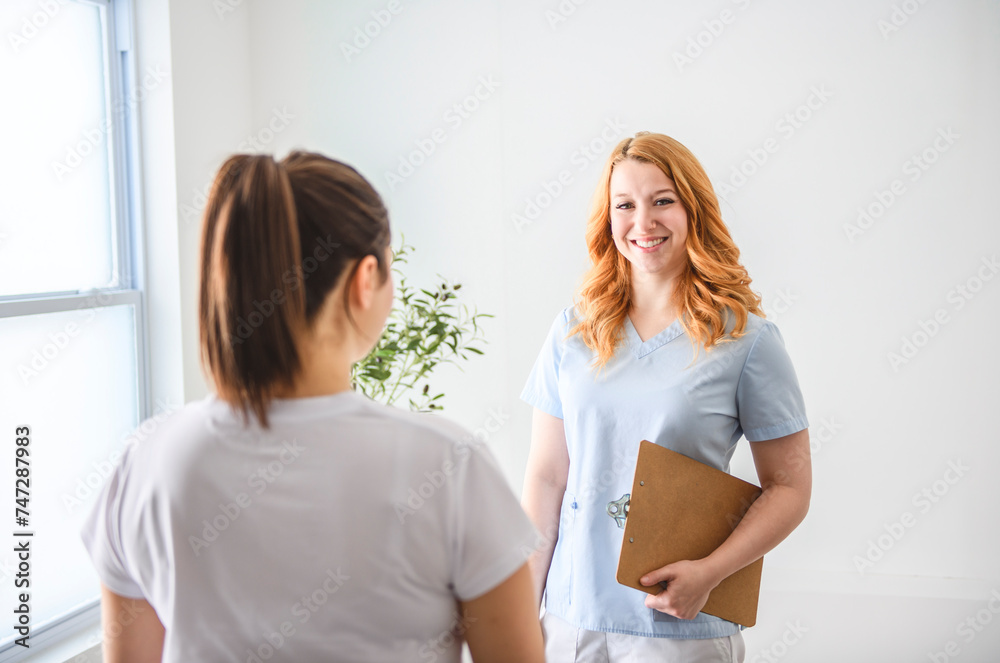 Modern rehabilitation physiotherapy at work with client Modern rehabilitation physiotherapy at work with client