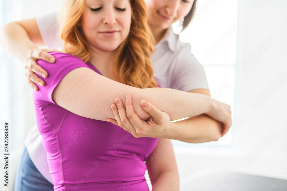 Modern rehabilitation physiotherapy at work with client Modern rehabilitation physiotherapy at work with client
