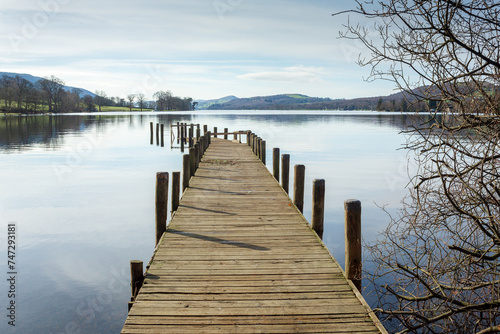 wooden pier on lake © David