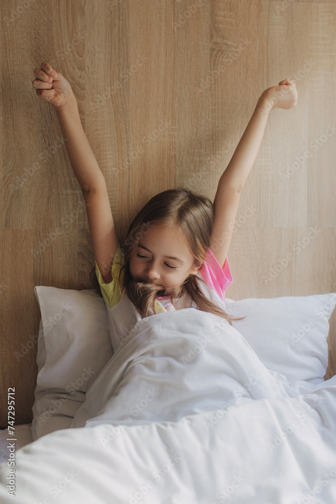 Little girl sleeping at home. Close up horizontal photo copy space for text top above view. Pre-teen relaxing in bed bedroom enjoy. Health and beauty concept Little girl sleeping at home. Close up horizontal photo copy space for text top above view. Pre-teen relaxing in bed bedroom enjoy. Health and beauty concept