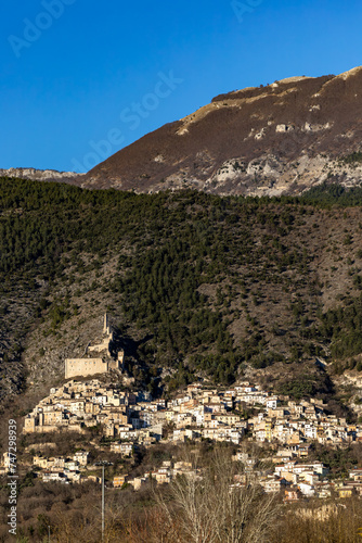 Roccacasale, Italy The village on the hillside of the Monte della Rocca with an old ruin at the top. photo