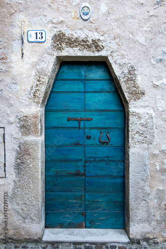 Castrovalva, Italy A blue door in the old historic part of town. photo