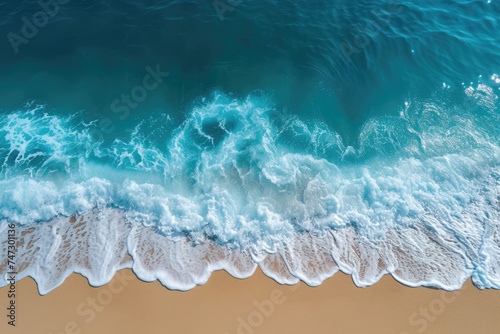 The calm of ocean waves on a deserted beach, turquoise sea and untouched sands aerial view of a peaceful, deserted beach with calm ocean waves gently breaking against sandy shores
