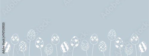 Blue banner for Easter decoration. Silhouettes of Easter eggs growing like flowers in vintage style with floral elements. Unique design for the decoration with free place for your text.