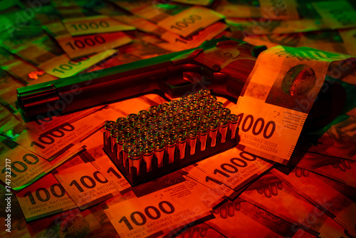 Elegant Semiautomatic 9mm Handgun with Swiss Helvetia Symbol Leaning on Swiss Franc 1000 Banknote and Bullet Ammunition in Switzerland.