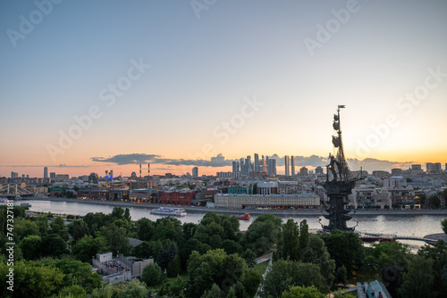 View of the monument to Peter the Great by Zurab Tsereteli in the center of the Russian capital on a summer evening photo