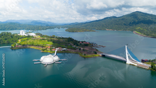 Kenyir Lake, which is located upstream of Sungai Kenyir, Terengganu, is the largest lake ever built by humans to generate electricity in Southeast Asia.  The lake covers an area of ​​260 square km.
