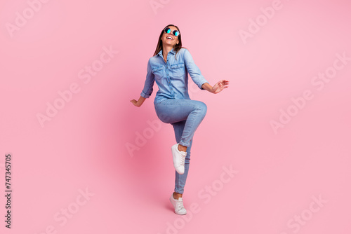 Photo of sweet shiny lady wear white blouse glasses dancing empty space isolated pink color background