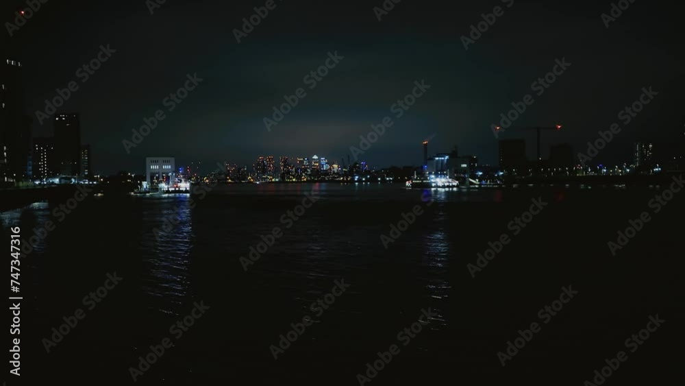 Woolwich river thames view of canary wharf at night filter Woolwich river thames view of canary wharf at night filter