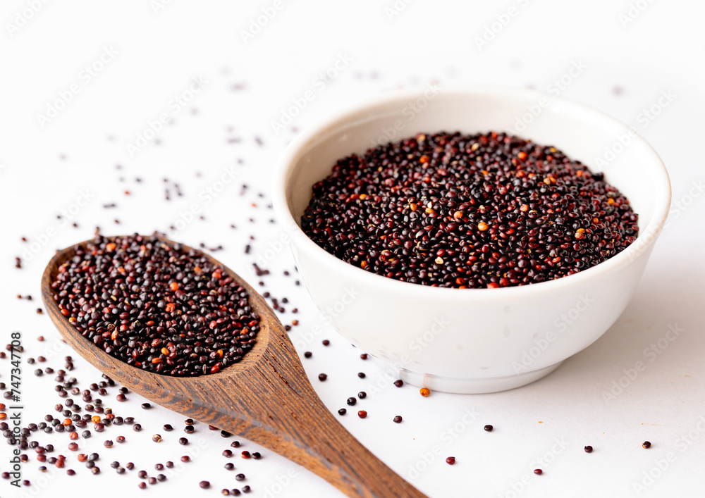 Organic Black Quinoa on a Wooden Spoon. Healthy Eating Concept. View from Above. Organic Black Quinoa on a Wooden Spoon. Healthy Eating Concept. View from Above.