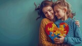 Happy family. Mother and daughter are holding a puzzle heart on a blue background. Mental health care concept with autistic child's supported by nursing family caregiver.