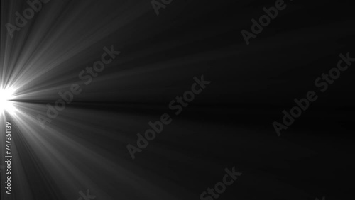 White light beams on black background. Light animation. Dynamic sun rays. 25fps photo